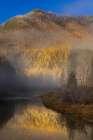Foggy autumn sunrise on McDonald Creek and Apgar Mountain in Glacier National Park, Montana, USA Art Print